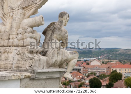 Statue over looking a city scape