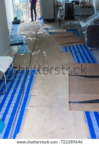 corrugated paper and blue and white weaving pvc textile for construction temporary put on the floor for prevention floor dirty