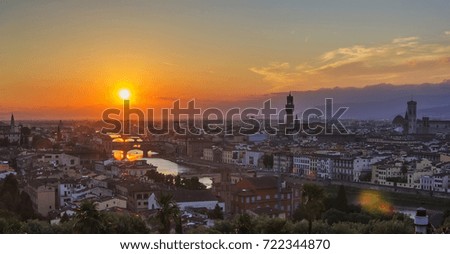 background view of the panorama of the old city of Florence, overlooking the Arno River, the Ponte Vecchio and the Duomo