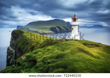 Mykines lighthouse, Faroe Islands Royalty-Free Stock Photo #722440150