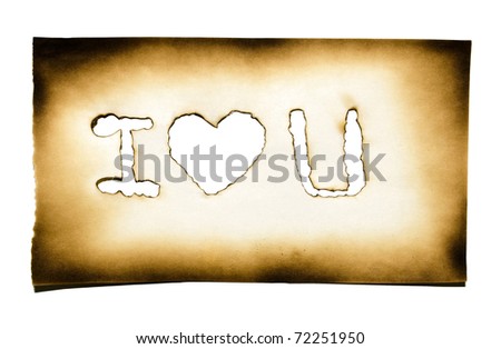 Burned paper with heart and "i love you" text in burned hole on white background with clipping path