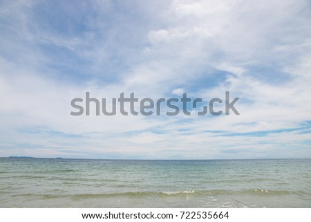 tropical sea and beach with blue sky background