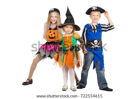 Children in Halloween Costumes of Little Witch and Charming Pirates  going to Halloween or Carnival Party
