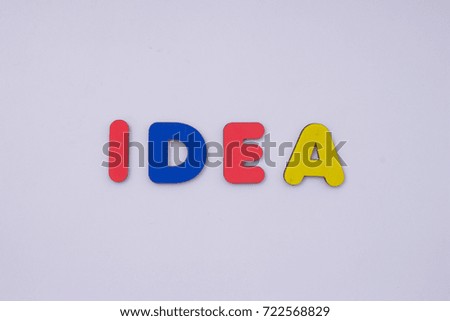 Words from wooden letters on light grey background