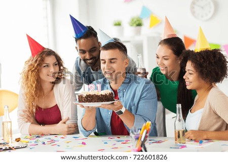 corporate party and people concept - happy team with cake and non-alcoholic drinks celebrating colleague 21st birthday at office party