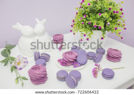 Delicate pink and white flowers. View from above. Flat lay. macarons. 