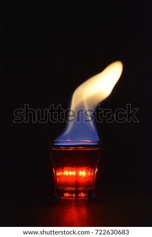 A shot of burning white liquor