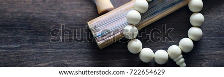 Different objects with traditional religious oriental on a wooden background
