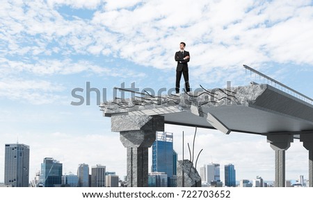 Confident businessman in suit looking away while standing on broken bridge with cityscape on background. 3D rendering.