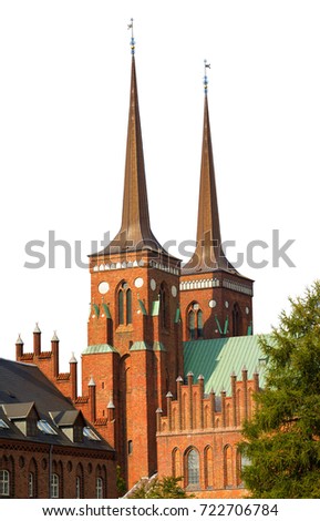 Famous Roskilde Cathedral with twin bell towers where the crypt of royal danish families are located, Denmark. Isolated on white background