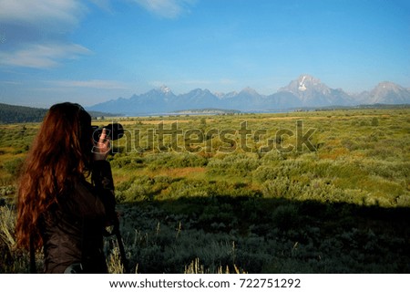 Photographer in mountains 