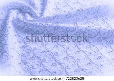 Texture background of fabric. Cloth with perforated circles. Texture of fabric, close up background of blue texture Texture of fabric in pastel colors.