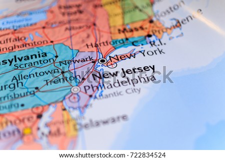 New York and New Jersey on the map in the atlas Royalty-Free Stock Photo #722834524