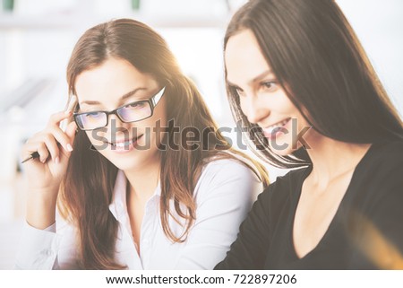 Close up portrait of two attractive caucasian ladies