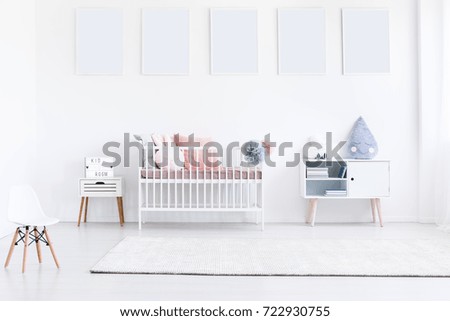 Gallery of mockups of white posters in girl's bedroom with small white chair and pink pillows on bed