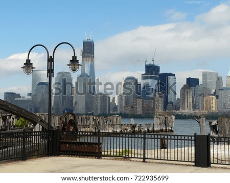 Downtown skyline NYC view while building the new towers from the pier