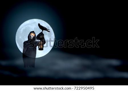 Grim Reaper and crow with super moon blur background,Halloween day,Ghost puppet