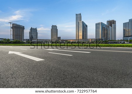 urban traffic road with cityscape in background in Shanghai,China.
