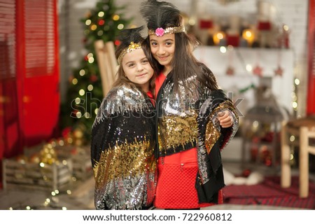 Sisters with christmas background