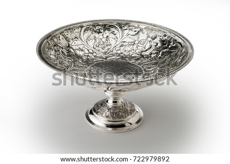 Round bowl embossed stand with central foot sheffield isolated on white