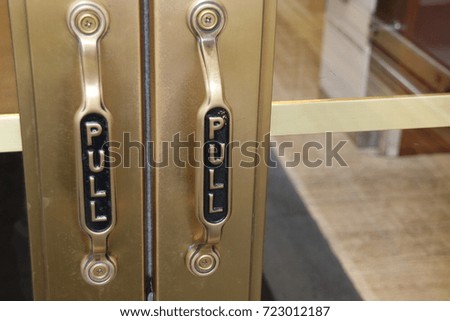 Shining metal door knob "pull"