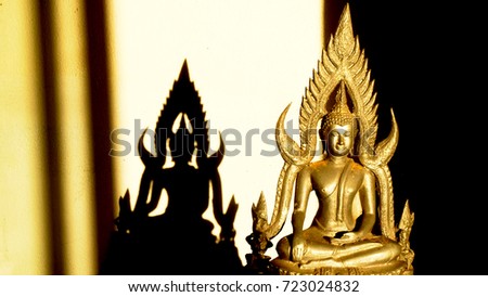 Buddha statue and 
Shadow