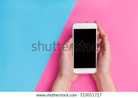 hand holding phone isolated on white clipping path inside
