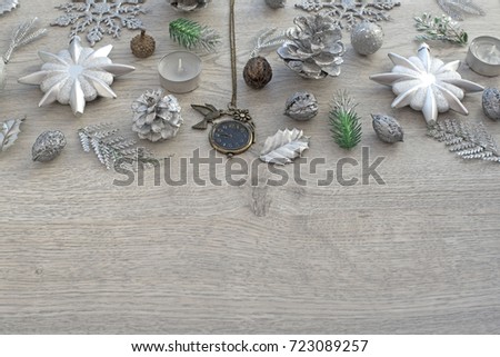 Christmas decorative composition flat lay. Top view of Wooden light background