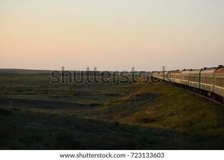  many railway wagons in beautiful landscape