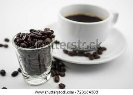Black coffee in white cup ready to serve.It make feeling relax.