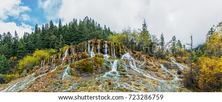 Panorama of cascading waterfall. Jiuzhaigou Valley was recognize by UNESCO as a World Heritage Site and a World Biosphere Reserve - SiChuan, China