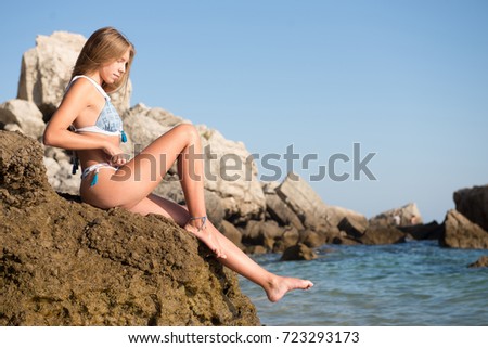 beautiful young girl posing on a sunny day