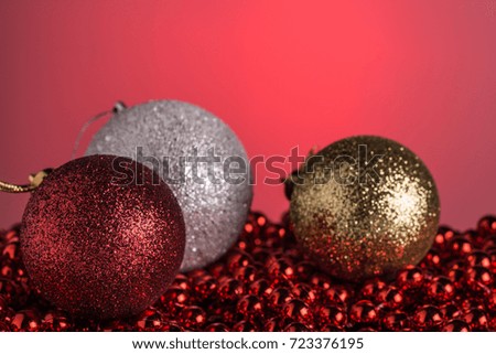 Christmas composition on a red matte background.