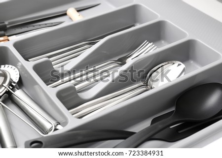 Kitchen utensils in drawer, closeup