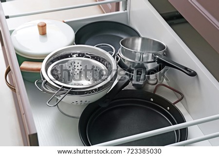 Set of kitchen utensils in drawer