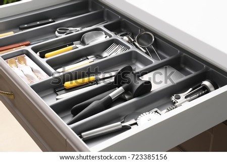 Kitchen utensils in drawer