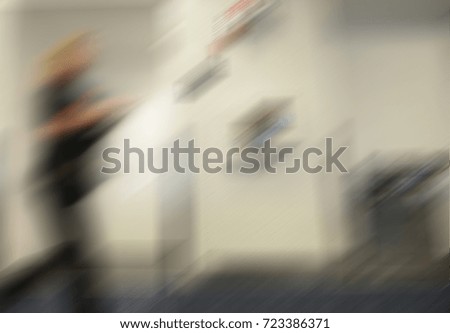 Very Interesting Abstract Image of People Inside a airport terminal