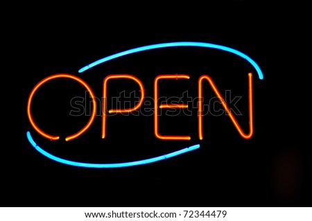 Typical "Open" diner and restaurant neon sign welcoming and inviting guests to come in!