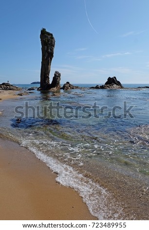 Sea, rocks, sandy beach. Tachingoza Bay. Primorye. Russia.