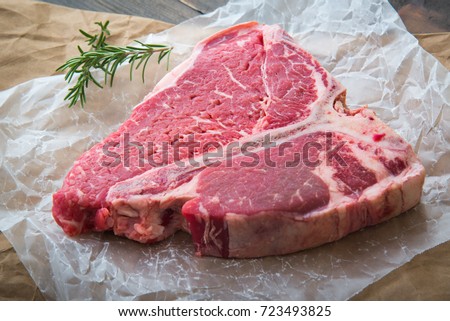porterhouse steak Royalty-Free Stock Photo #723493825
