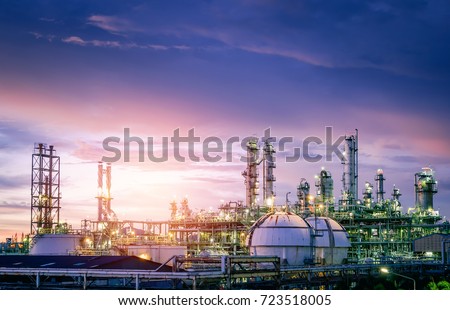 Oil and gas refinery plant or petrochemical industry on sky sunset background, Factory with evening, Gas storage sphere tank in petrochemical industrial Royalty-Free Stock Photo #723518005