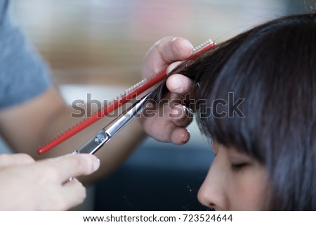 hair salon concept. Fringe trim. Royalty-Free Stock Photo #723524644