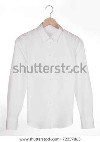 white shirt on a hanger Royalty-Free Stock Photo #72357865