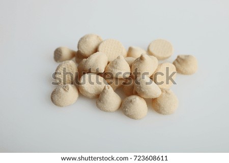 Food for rodents. Granulated vitamins on a white background.