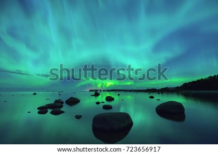Aurora borealis northern lights over the Gulf of Finland Royalty-Free Stock Photo #723656917