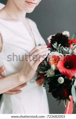 the bride's bouquet of peonies and roses, asymmetrical and modern