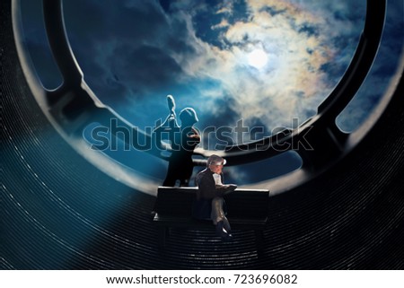 View of miniature human toy on dark background with moon. Murder mystery.