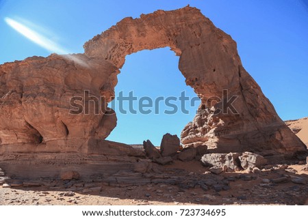 Natural arch in sahara 