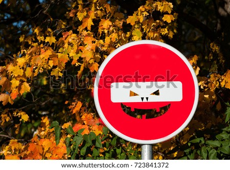 road sign brick with halloween face