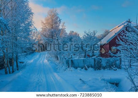 wooden house with boarded up windows for winter, winter landscape Royalty-Free Stock Photo #723885010